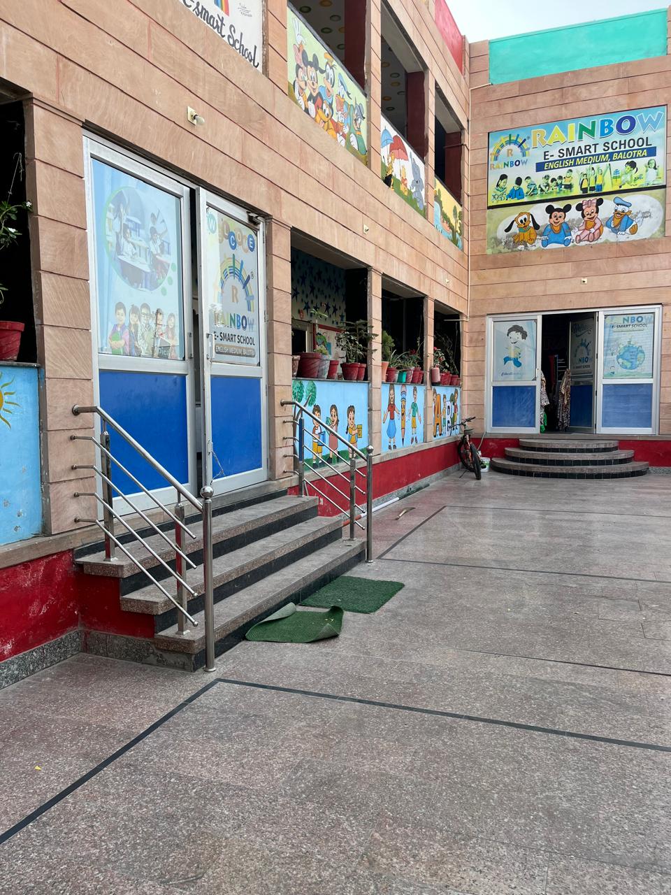 Students in an E-Smart Classroom environment at Rainbow E Smart School